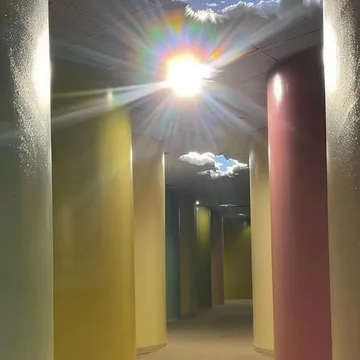Sunburst in a colorful corridor.