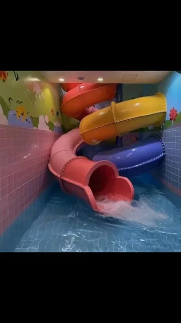Bright water slides within a black-framed image.