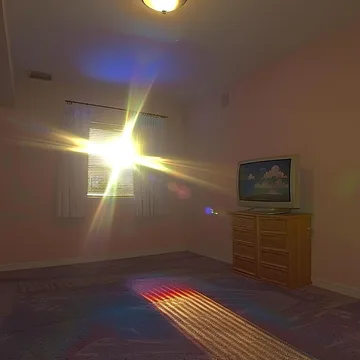 Sunburst above a colorful carpet.