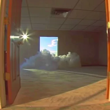 Cloud in an empty room with an open door.