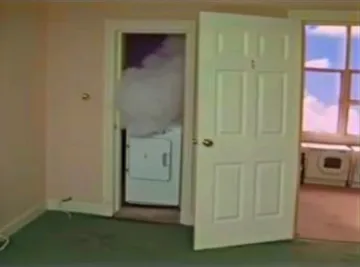 Open doors inside a pastel house.