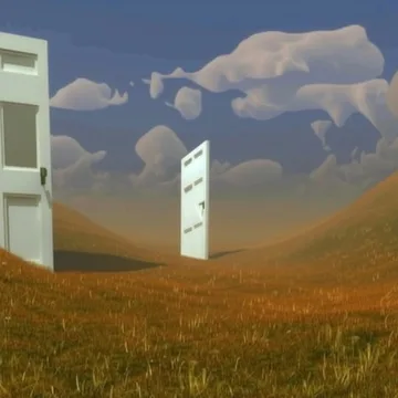 Open doors standing in a golden field.