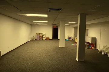 Wide empty beige basement.