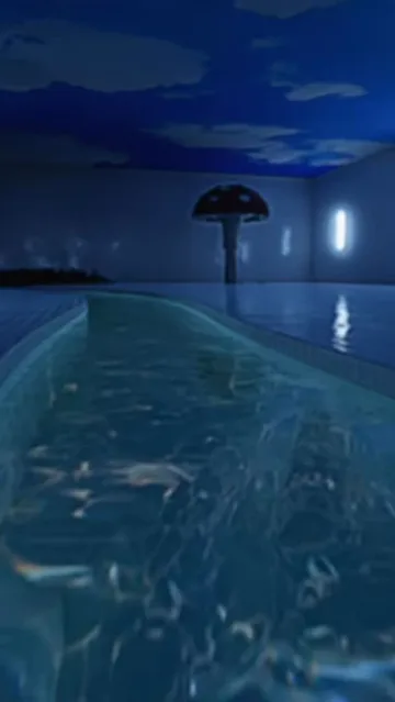 Moonlit blue water leading toward distant towers.