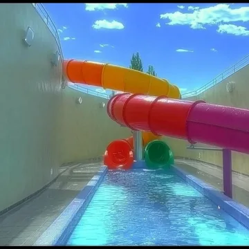 Bright tube slides in a sunlit pool.