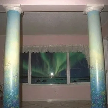 Pale columns before a dark star-filled opening.