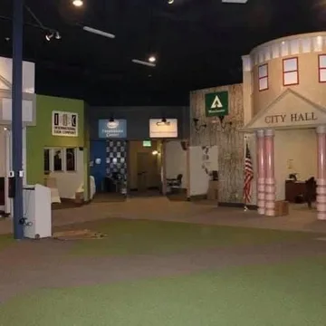 Empty indoor street with model building facades.