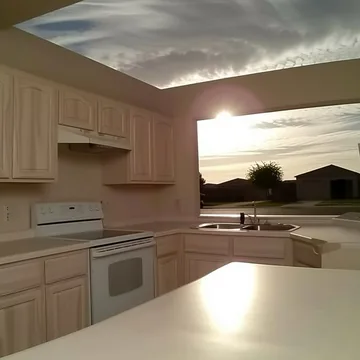 Open kitchen beneath dramatic clouds.
