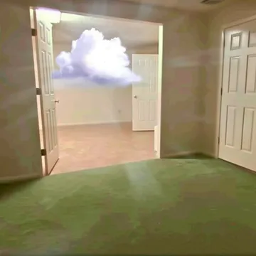 White cloud seen through open kitchen doors.