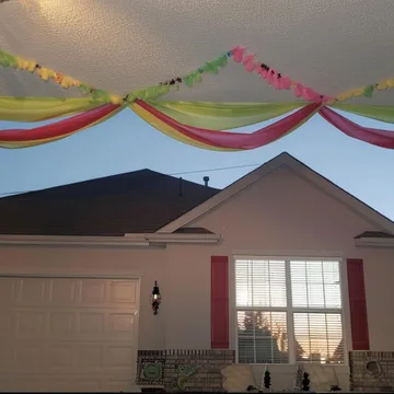 Streamers above a suburban garage.