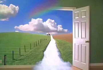 Open door beside a path through green fields.