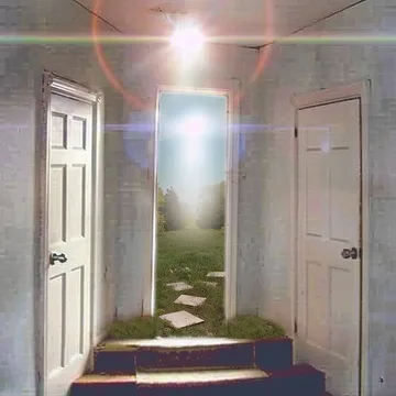 Light flaring through a pale hallway.